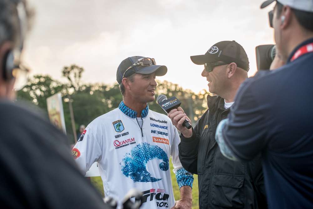 Mercer talks to 2015 Bassmaster Classic champion Casey Ashley about his fishing plan on day three. 