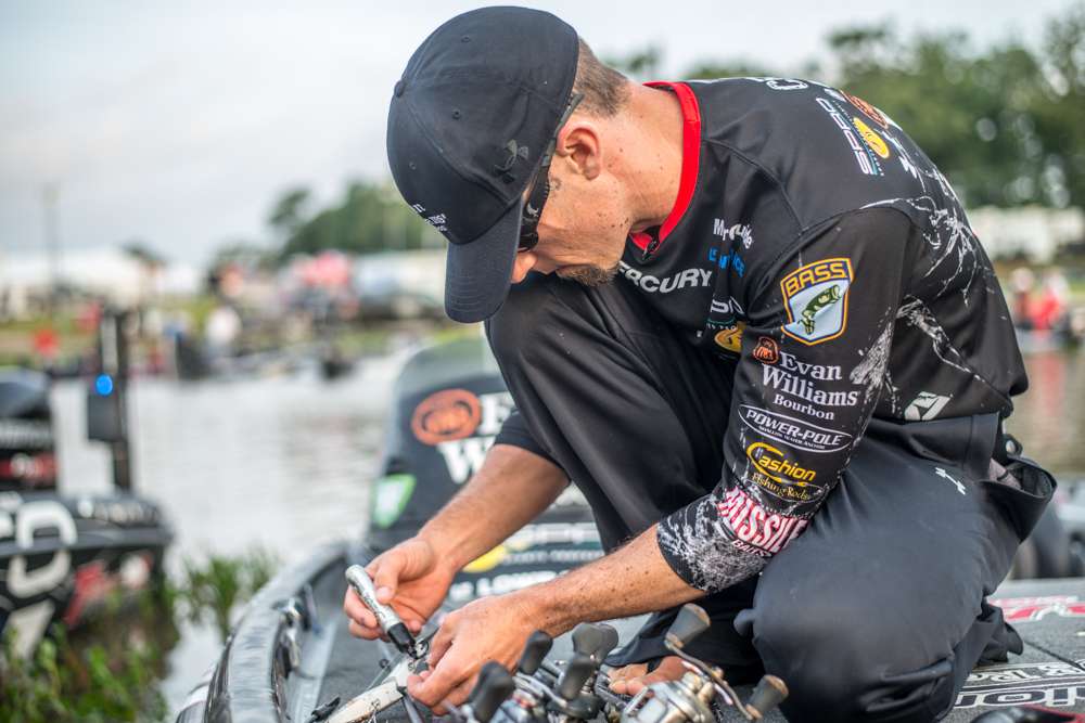 John Crews uses a Sharpie to make his bait look better in the water. 