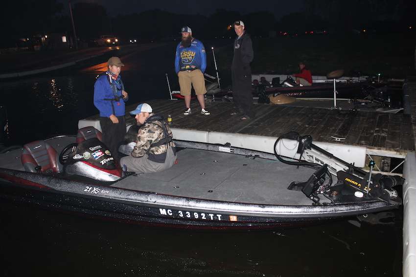 Anglers sit and talk about the day to come prior to takeoff. 