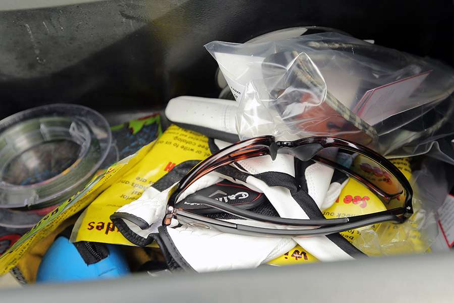 The glove box is where he keeps an extra pair of sunglasses, along with rags, towels, spray for his electronics and sometimes his keys.