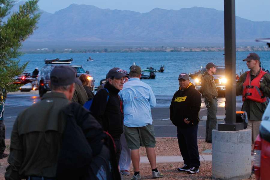 Bassmaster Marshals wait in their Elite anglers to arrive.