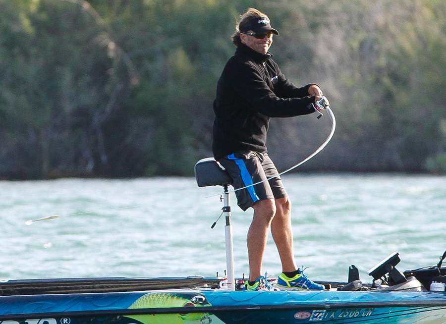 Byron Velvick grimaces as he heaves a big swim bait. He is recovering from a back injury sustained during the last Elite Series event on the California Delta. 