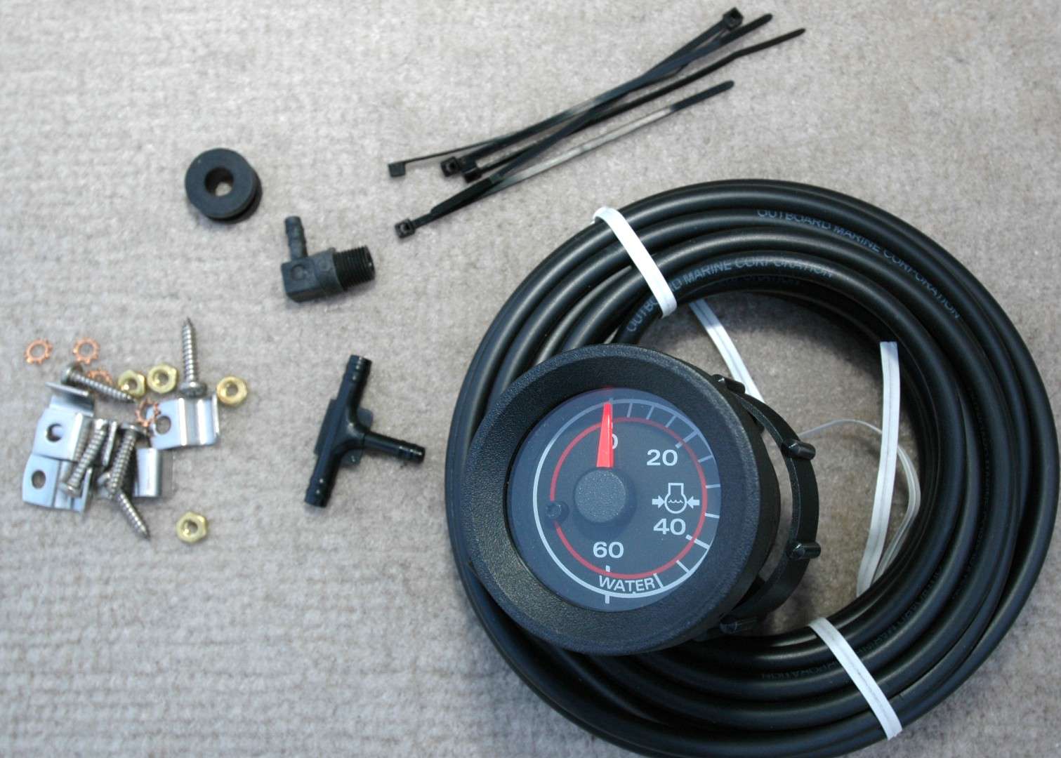 <em>INSTALLING A WATER PRESSURE GAUGE</em>
<br>Next up, every bass boat should have a water pressure gauge. It tells you when the water pressure is low before any alarms go off. You can buy a water pressure gauge kit that includes everything needed for installation.