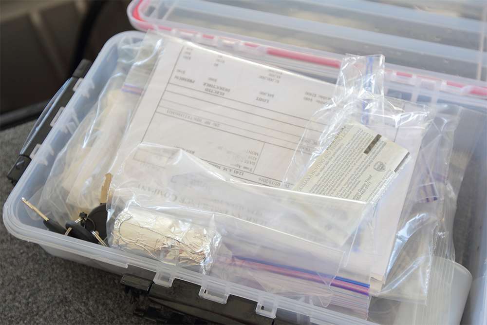 It's a good idea to keep your valuable paperwork in a water-tight Plano box.