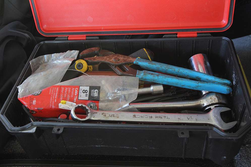 A black and red Bass Mafia box holds all of Swindle's tools.