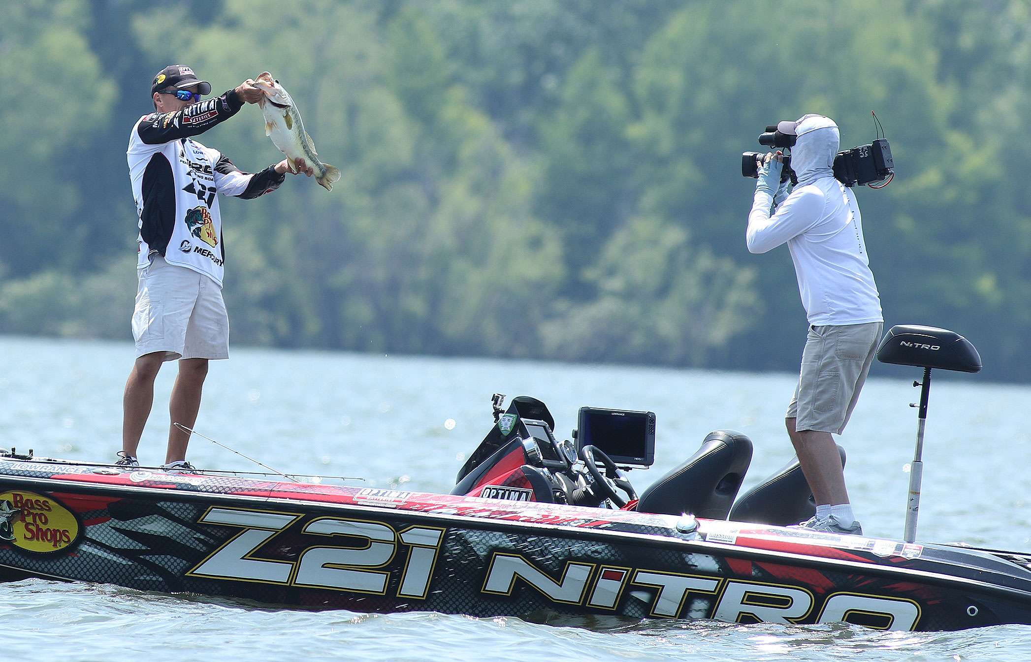 He showed it to the cameras and all the spectators before putting it in the livewell. The fish bit at 1:30 p.m.