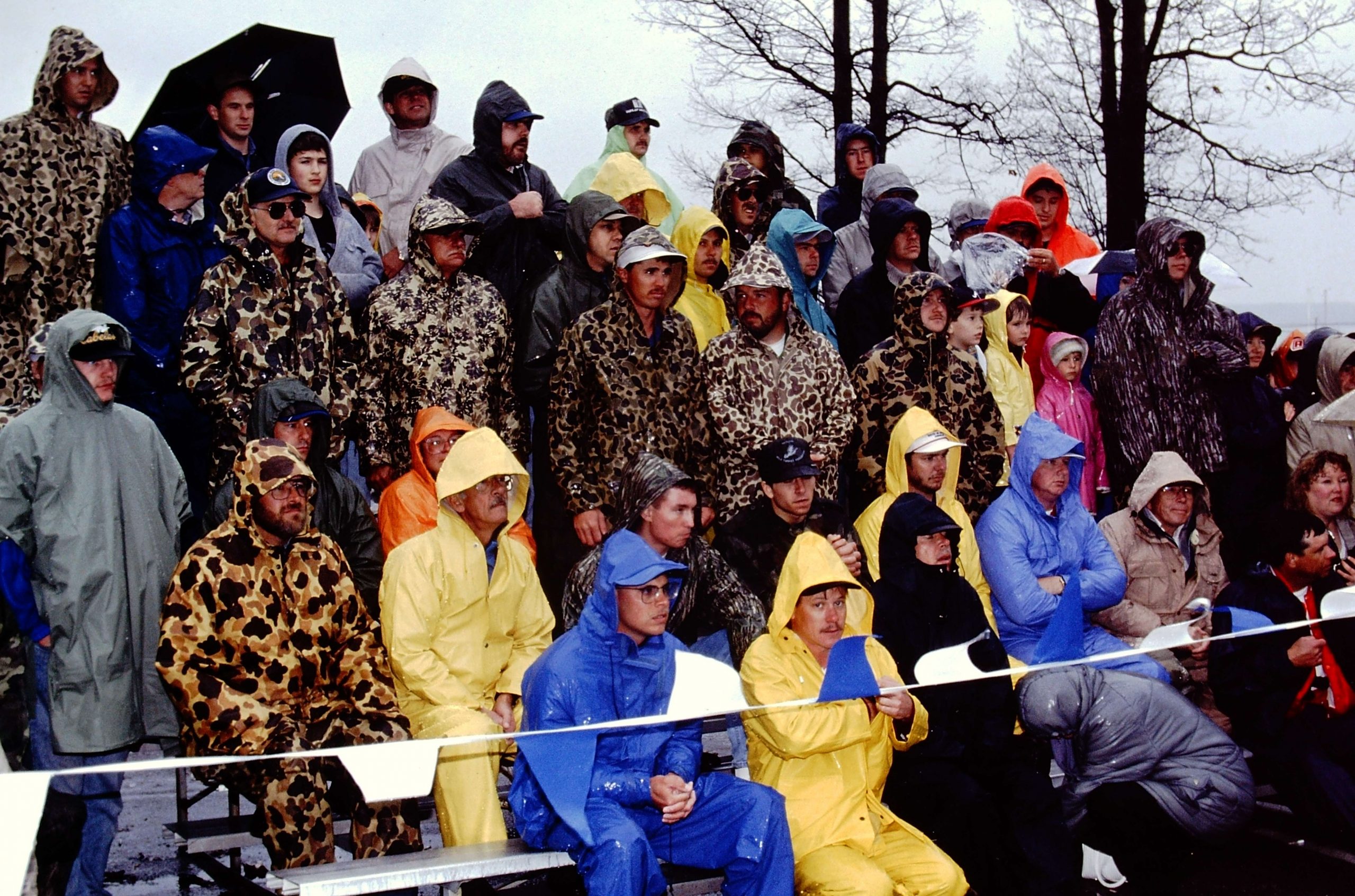 Soaked but dedicated fishing fans.