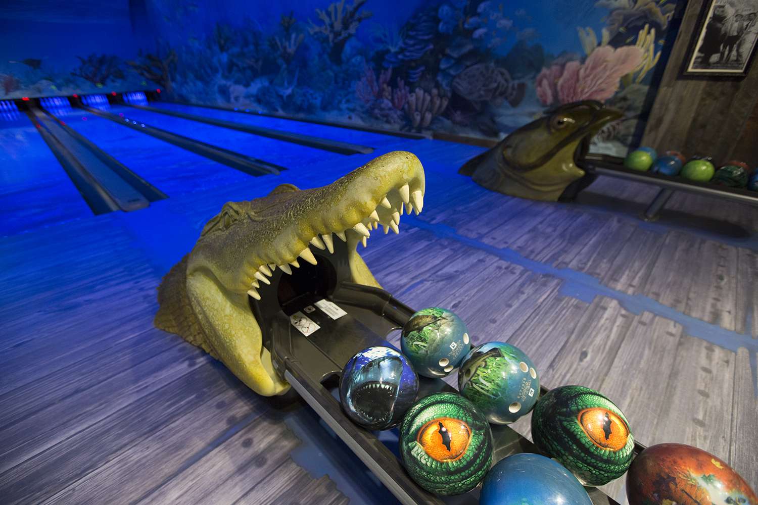 Uncle Buck's Fishbowl and Grill is a nautical-themed restaurant and bar featuring a saltwater aquarium and a 13-lane, ocean-themed bowling alley.