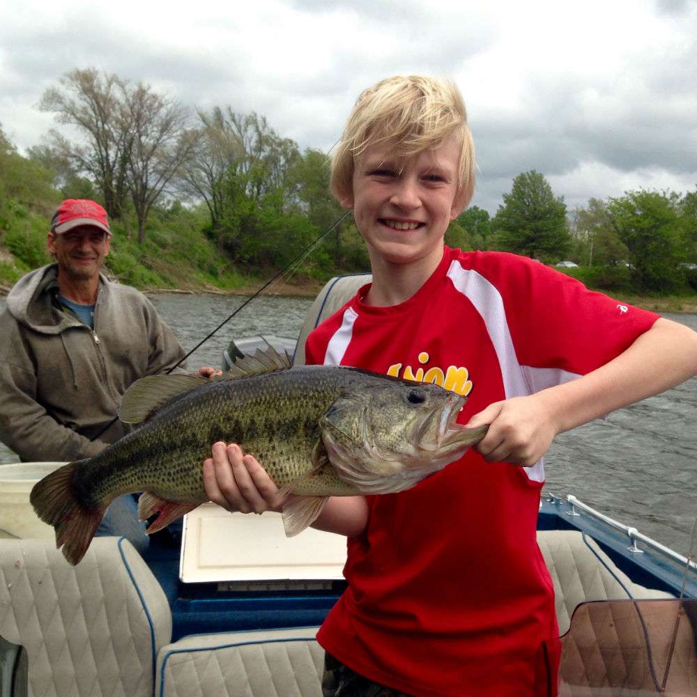 âI caught this big bass at a Cedar Rapids, Iowa, city pond. My son netted and modeled for me. It's a Iowa bass and a 5-pounder is like catching an 8-pounder down south.â  Submitted by Lon