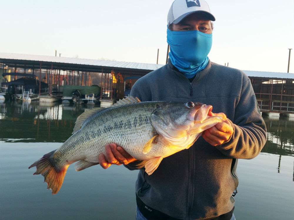 âAfter freezing all winter on the water, the fishing deities decided to give me this 11.5-pound largemouth bass.â Submitted by Scott