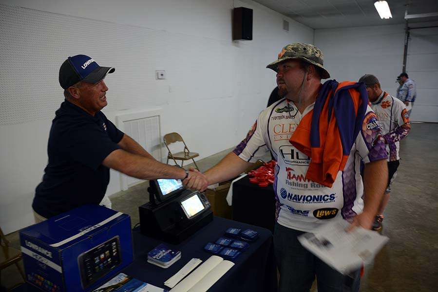 Tom Branch of Lowrance Electronics greets the team from Clemson.