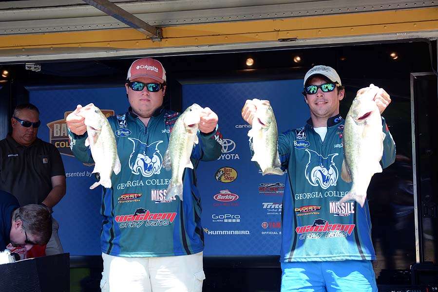 The bass held in the left hand of Justin Singleton also weighs 5-14. It puts Georgia College in the top 20 cut and 15th place overall. 