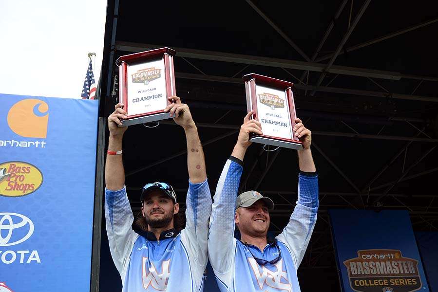 Butts and Rivers with their trophies. 