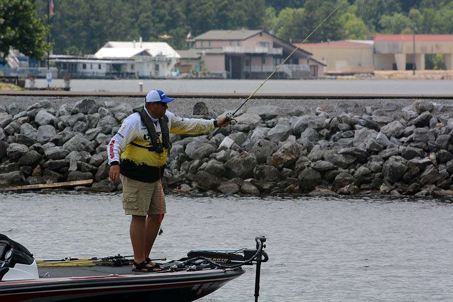 An angler makes a last ditch pitch for a catch near the weigh-in site at Madison Landing.