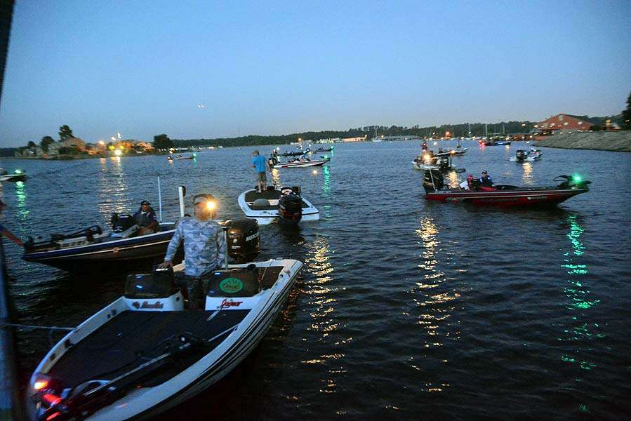 As the 80s hits continue to play the first flight of boats arrive in the basin at Madison Landing on Ross Barnett Reservoir. 
