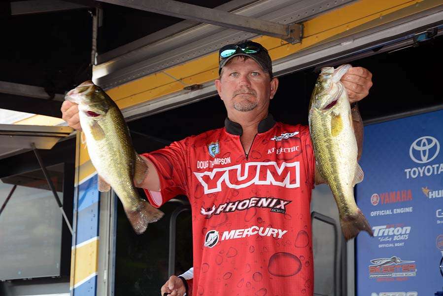 Doug Thompson with two of the fish that send the Arkansan to the B.A.S.S. Nation Championship. 