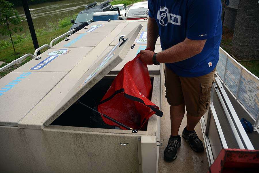 The fish are temporarily placed inside the release boat for return to the Monongahela River. 