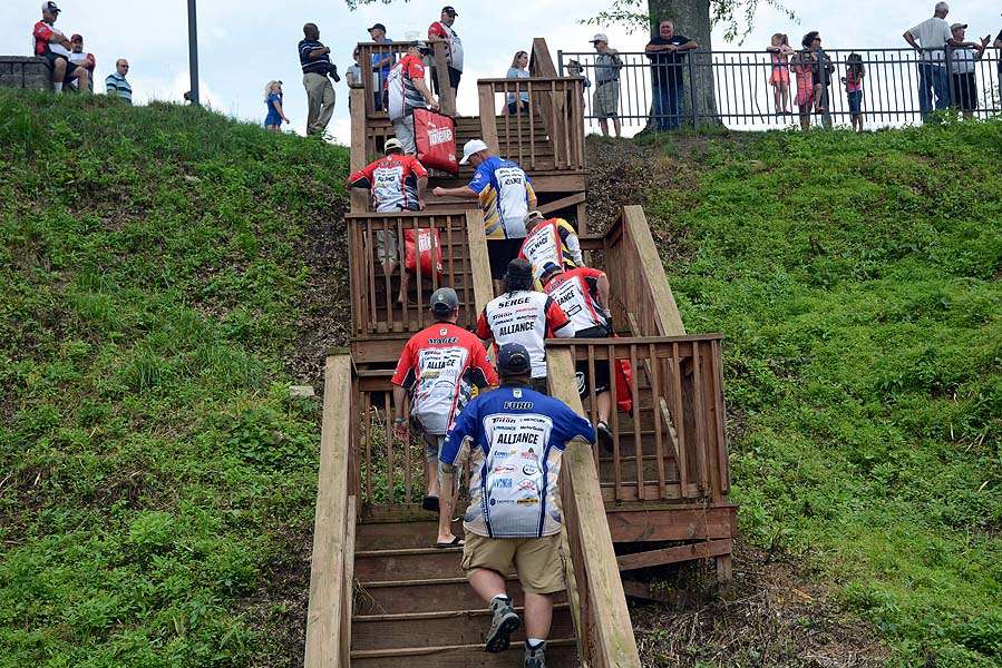 The first flight climbs the stairs to the weigh-in at Palatine Park in Fairmont. 