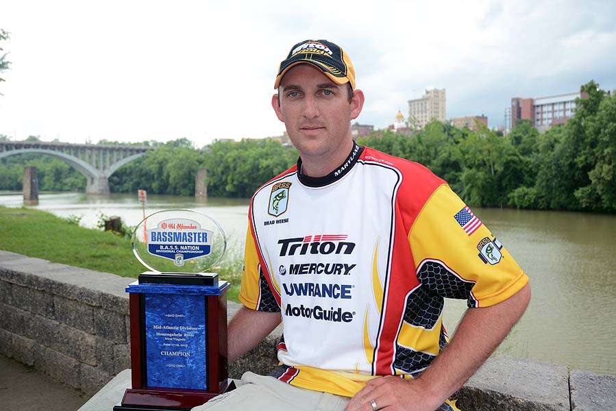 Winner Brad Weese poses in front of downtown Fairmont and the Monongahela River.