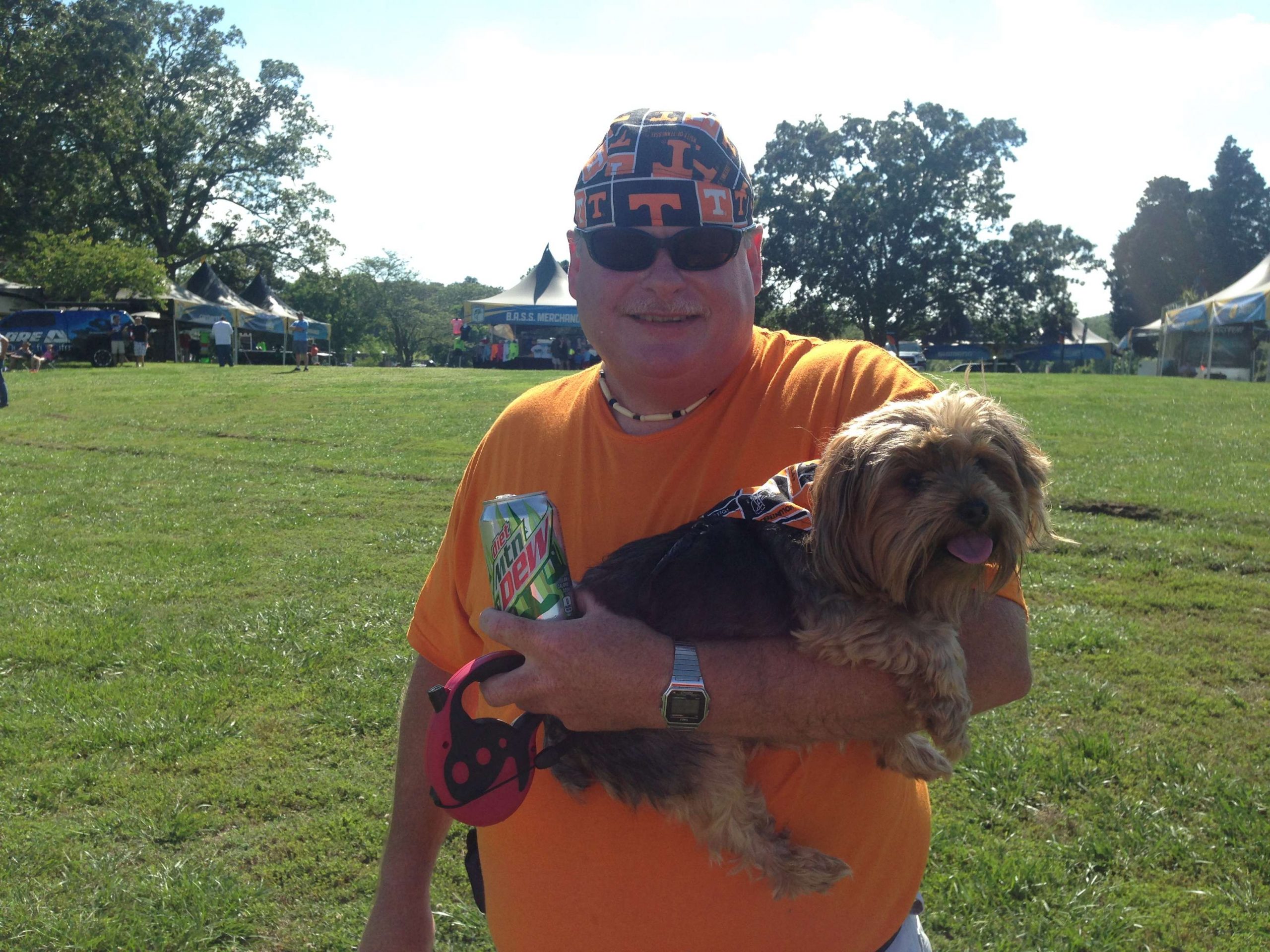 Tim and his dog Benji are just some of the bass fans checking out the weigh-in. 