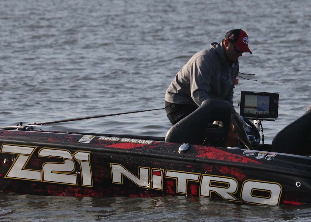 VanDam heads to the livewell with another. 