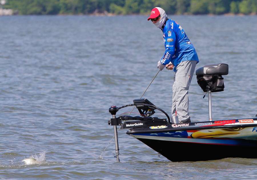 After watching Kelly Jaye boat his best of the day, Shaw Grigsby gets in on the fish catching action. 