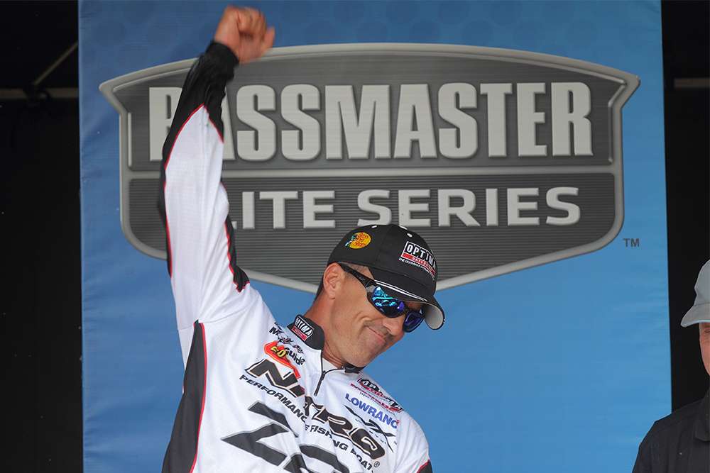 Edwin Evers celebrates as his total weight of 97-4 topped the field in BASSfest,