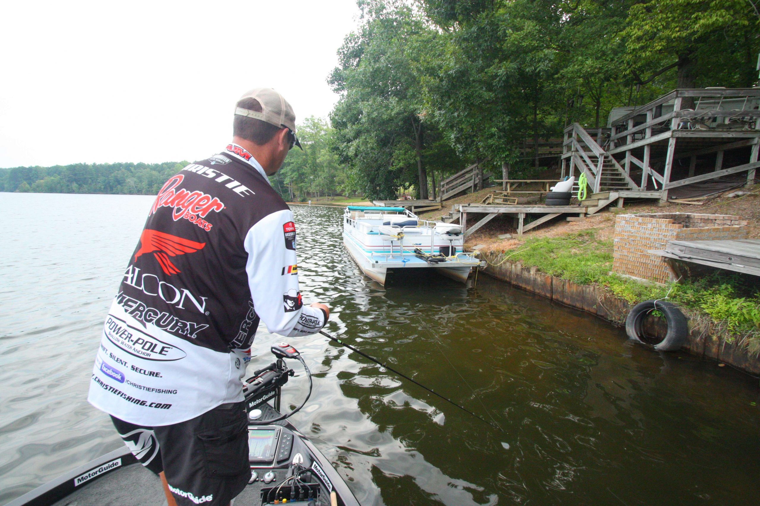 <b>7:55 a.m.</b> - Christie pitches a topwater lure under a pontoon boat on Lake L.