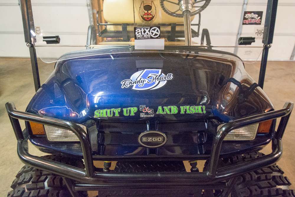 Randy's four-wheeler has his logo on it. This greets us as we enter the basement. 