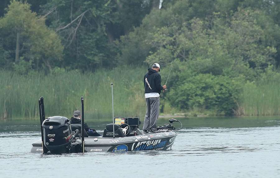 Our Day 1 action found us upriver, close to where Lake Ontario runs into the St. Lawrence River. Early in the morning, many of the anglers, like Marty Robinson were making quick stops.