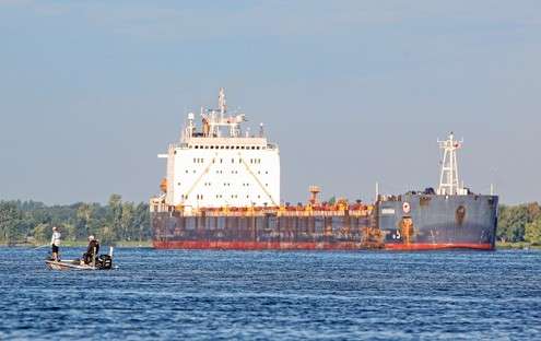 The town sits on the banks of the St. Lawrence, where huge ships travel with International commerce in the crystal-clear water of the river between Lake Ontario and Montreal.