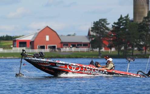 On one side is Canada, and the other is rural America in a picturesque setting.