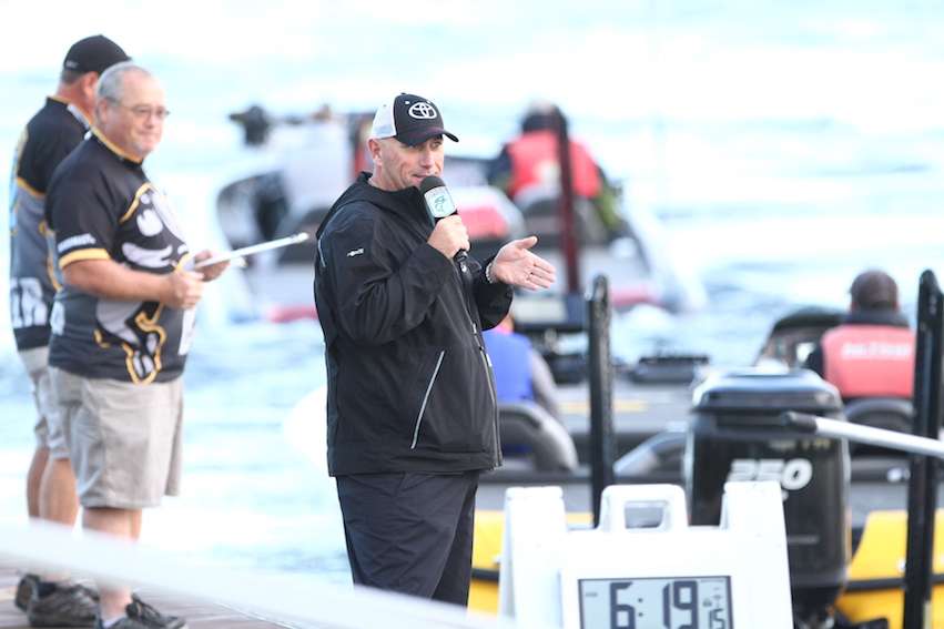 Dave Mercer announces the anglers as they drive through.