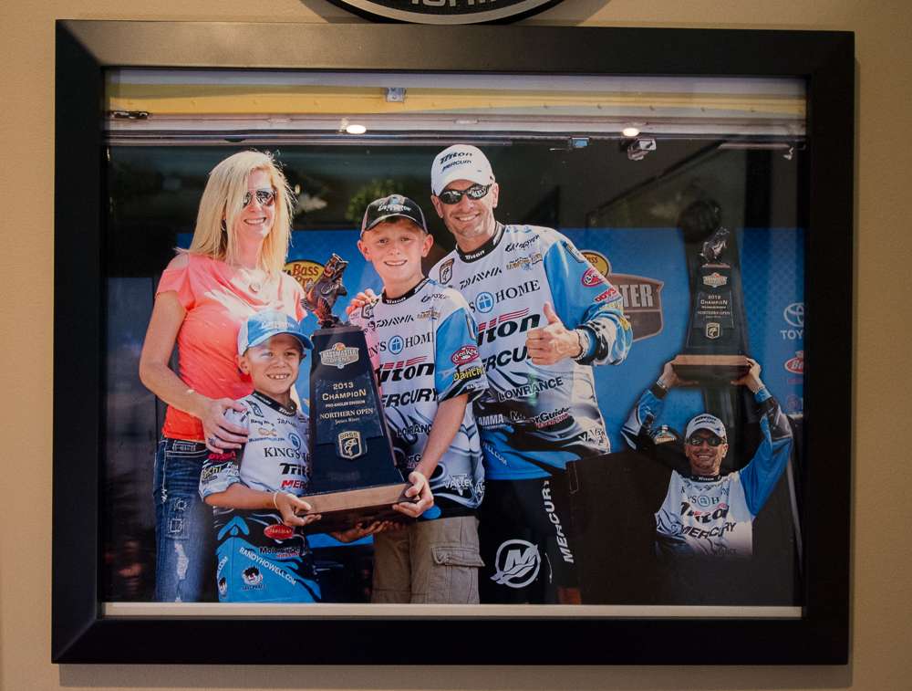 On the other wall is a framed photo celebrating his Open win on the James River. 