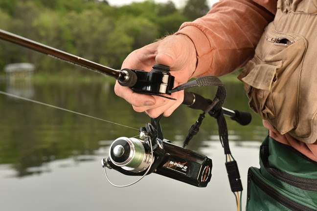 <b>M-POW-R</b><br>	NK100PH Reel/ Power Harness Combo<br>			The M-POW-R REELÂ® is a motorized spinning reel which enables physically-challenged (especially one-handed) anglers to rediscover the joy of fishing. The reel is designed to fit virtually any spinning rod, ice rod or fly rod, thanks to a M-POW-R Harness developed specifically for the reel. The new product package includes the M-POW-R spinning reel, M-POW-R Harness, 4 amp battery, battery charger, fanny pack, and a pulse width modulated speed control, which provides optimum torque throughout the motorâs power band. Anglers operate the reel with a thumb-actuated button attached to the rod (via the M-POW-R Harness).