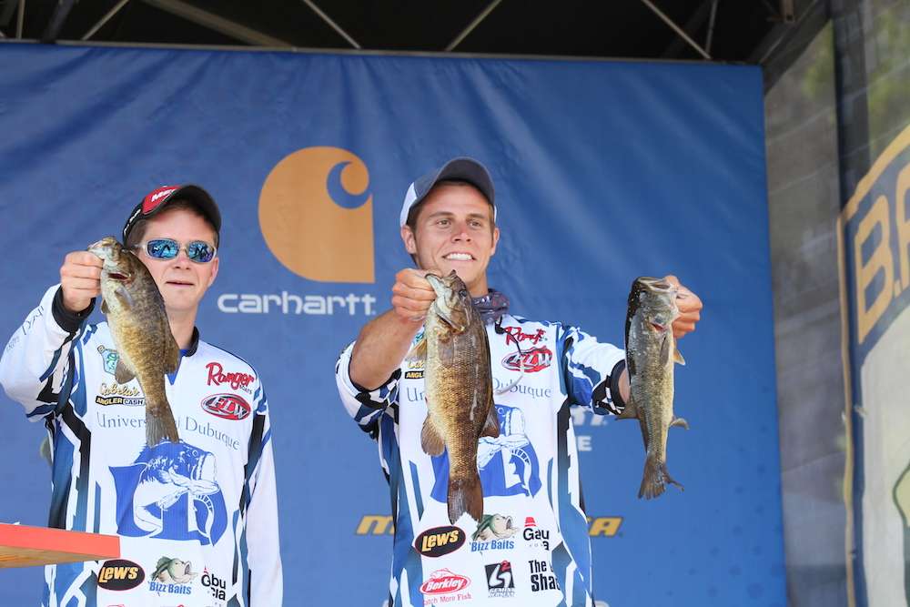 Austin Brimeyer and Anthony Riesberg of the University of Dubuque finish 7th with 9-9 for two days. 