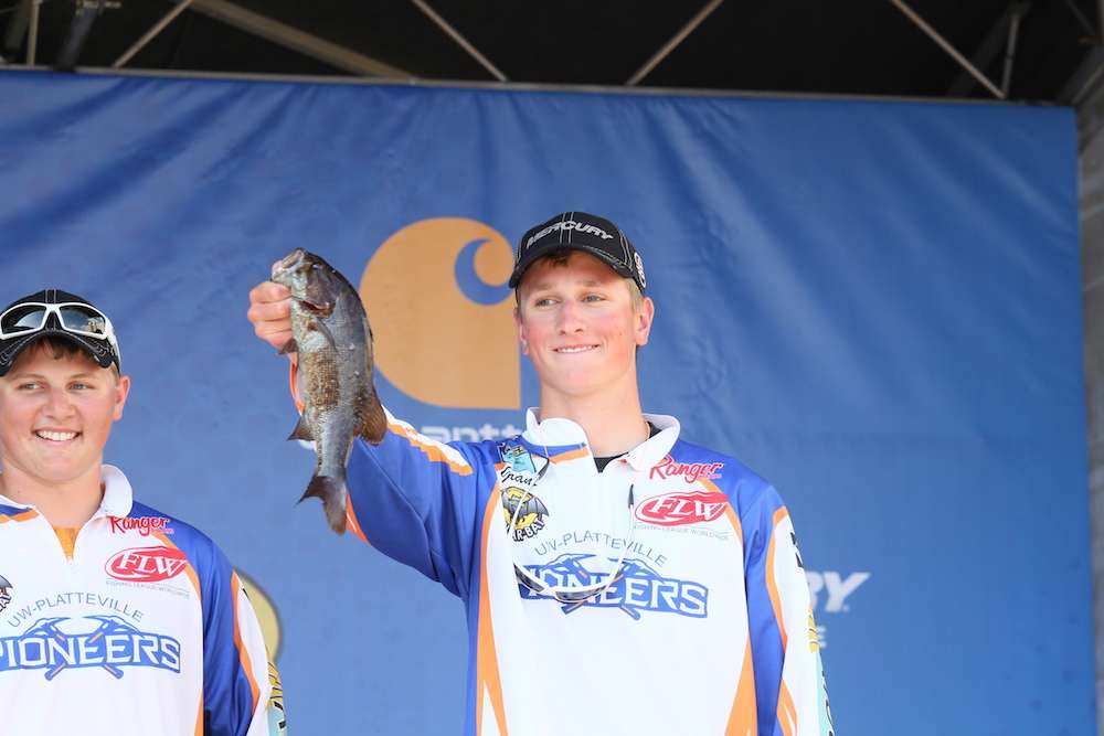 Grant Ehlenfeldt and Brett Stanek of the University of Wisconsin-Platteville win the smallest fish of the event award with this 1-2 monster smallmouth. 