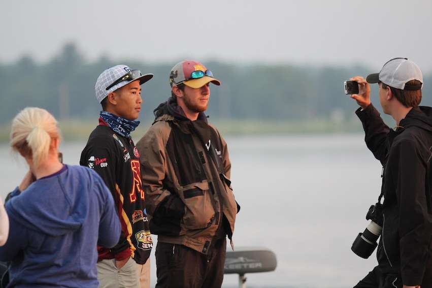 Ronnie Moore shoots a basscam with Minnesota's Trevor Lo and Chris Burgan.