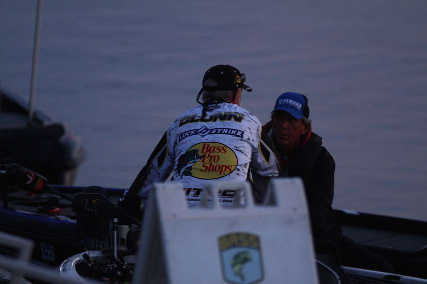 Rick Clunn and Zell Rowland talk early before takeoff on Day 1 of the Evan Williams Bourbon Elite Series Event on the St. Lawrence River.