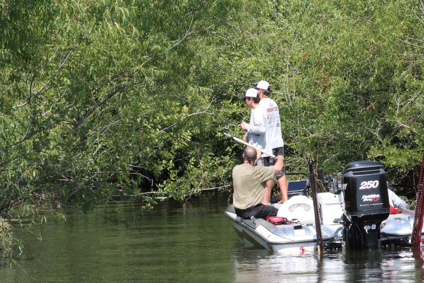 Cameraman Brian Mason gets the shot in the boat...