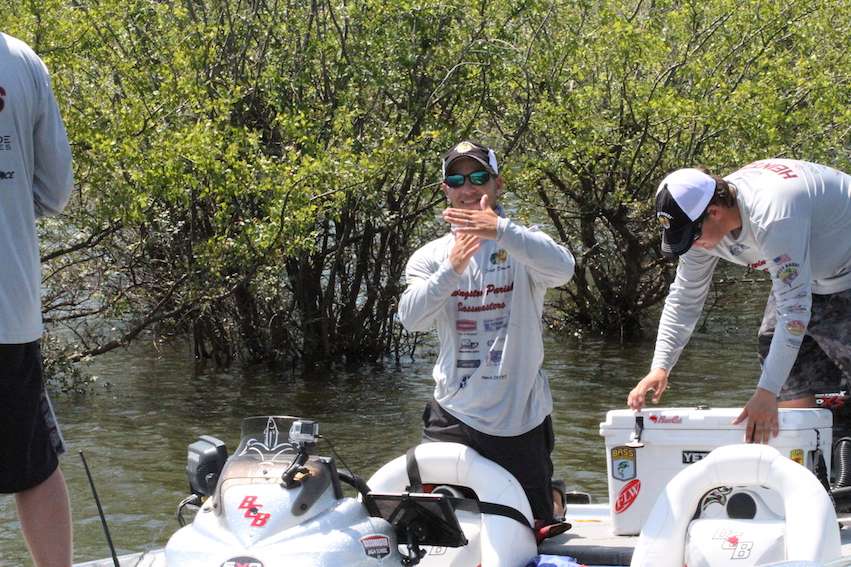 Boat captain Scott calls a timeout to see if they want to keep trying to catch more weight or if 21 to 22 pounds is good for them.