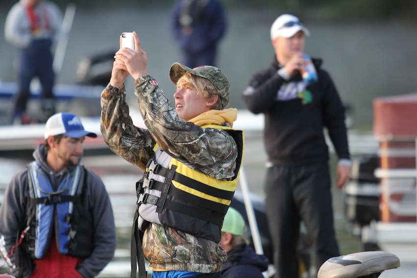 Anglers take a moment to snag a photo.