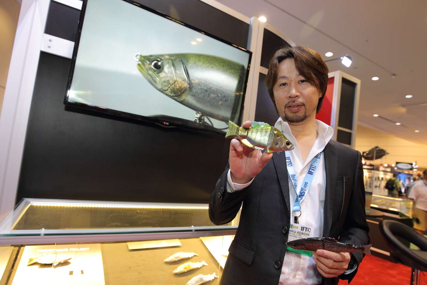 President Masahiro Adachi shows Duo's new swim bait.