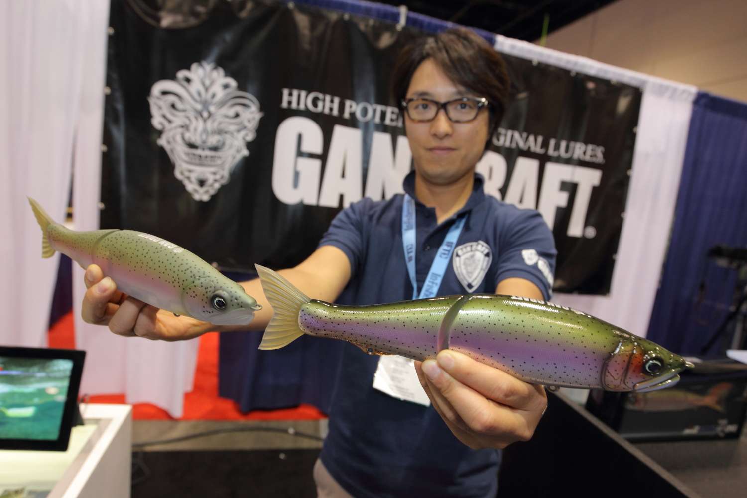 Kotaro Kake, exective sales Manager of Gan Craft, shows 13-inch swim baits.