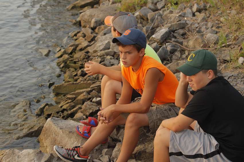 Young fans check out the anglers and watch intently.