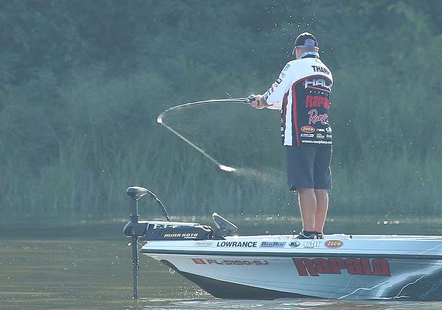 Behind him, Randall Tharp was working a shallow flat.