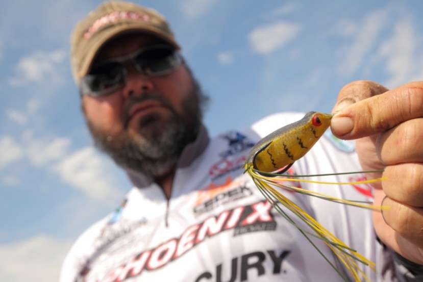 When punching the grass, he used a Strike King Rodent with 1 1/4-ounce Strike King Tungsten weight on a 6/0 Hack Attack Heavy Cover Flipping hook, also fished on 65-pound Gamma braid, with a Quantum 7-11 Hack Attack flipping Stick.