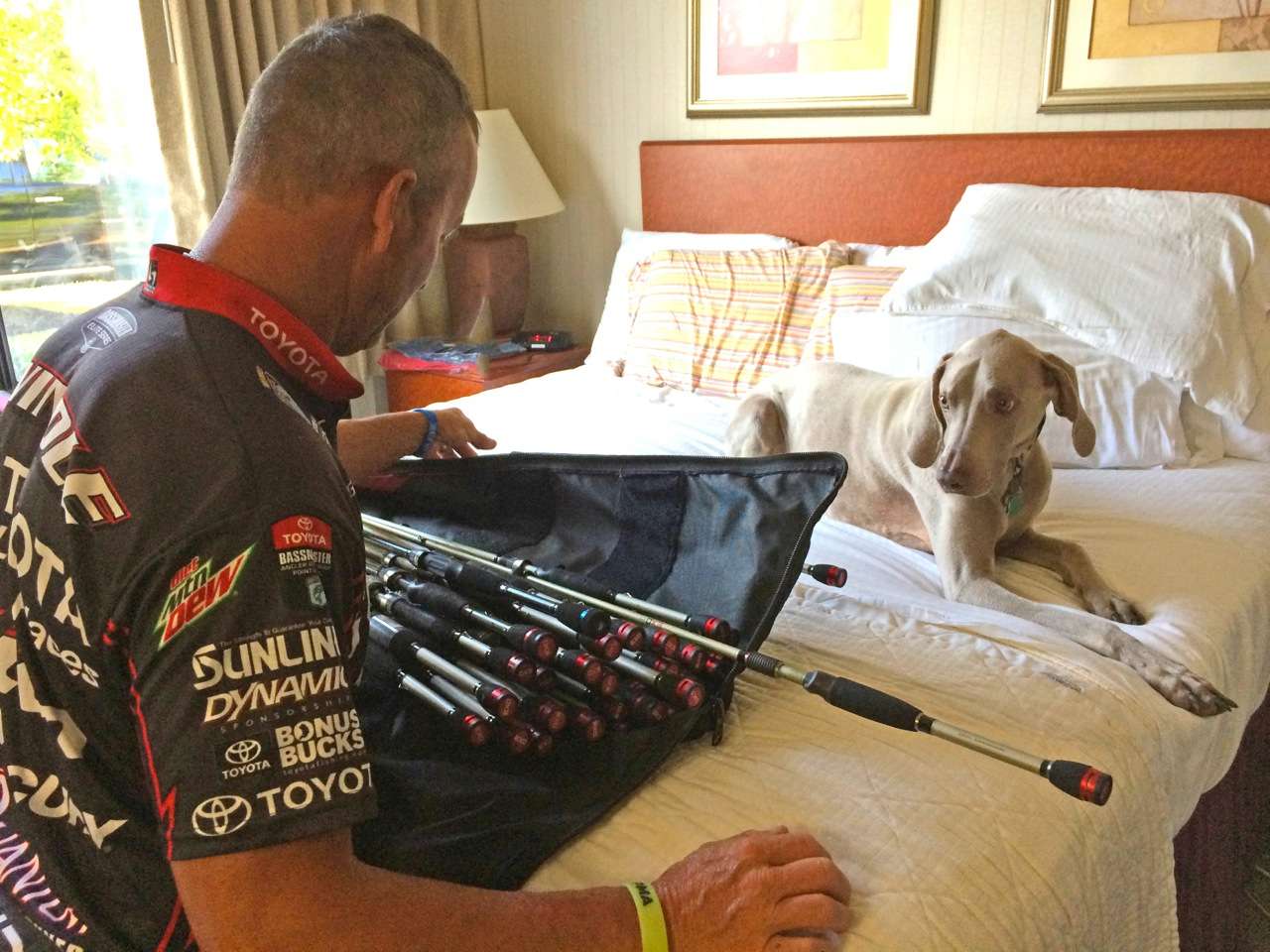 After Day 3 of competition, a wore-out Swindle knelt on the hotel room floor, and leaned on help from his best friend Myrick to pick out another cranking rod.