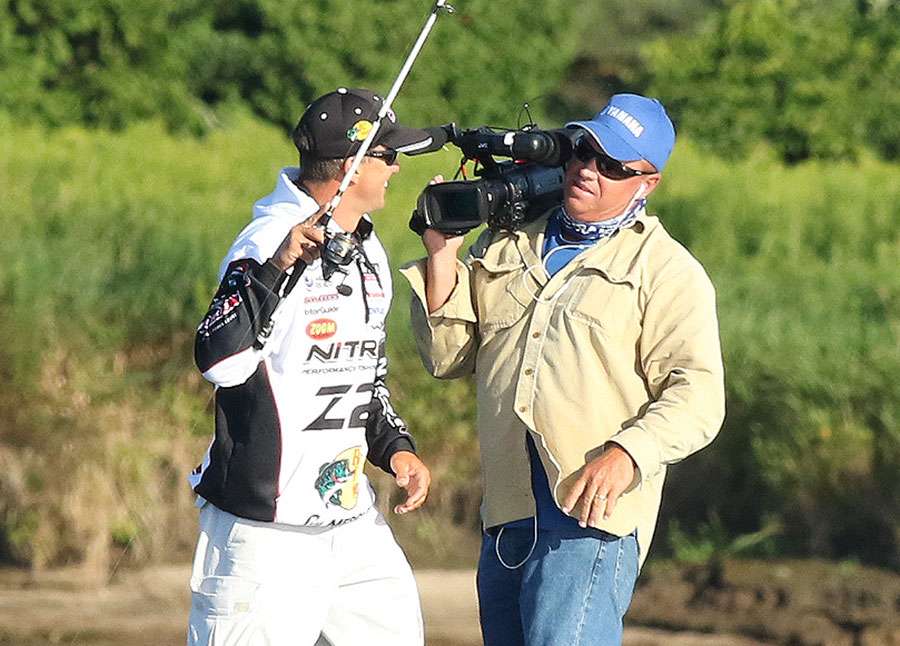 All of his fish battles lasted for several minutes because of the light line. And it gave him time to visit with his cameraman, Rick Mason, while it was fighting.