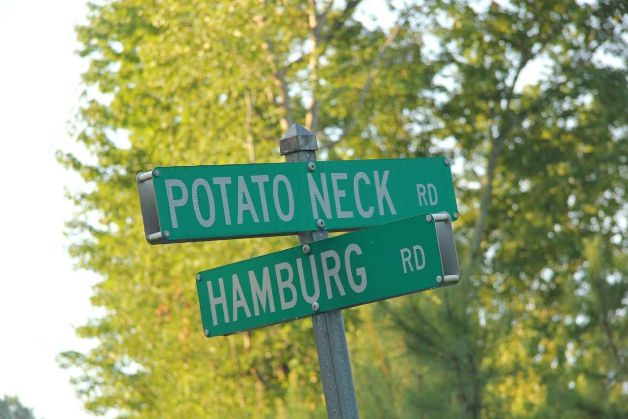 The uniquely named Potato Neck Road leads to the Powroznikâs driveway.